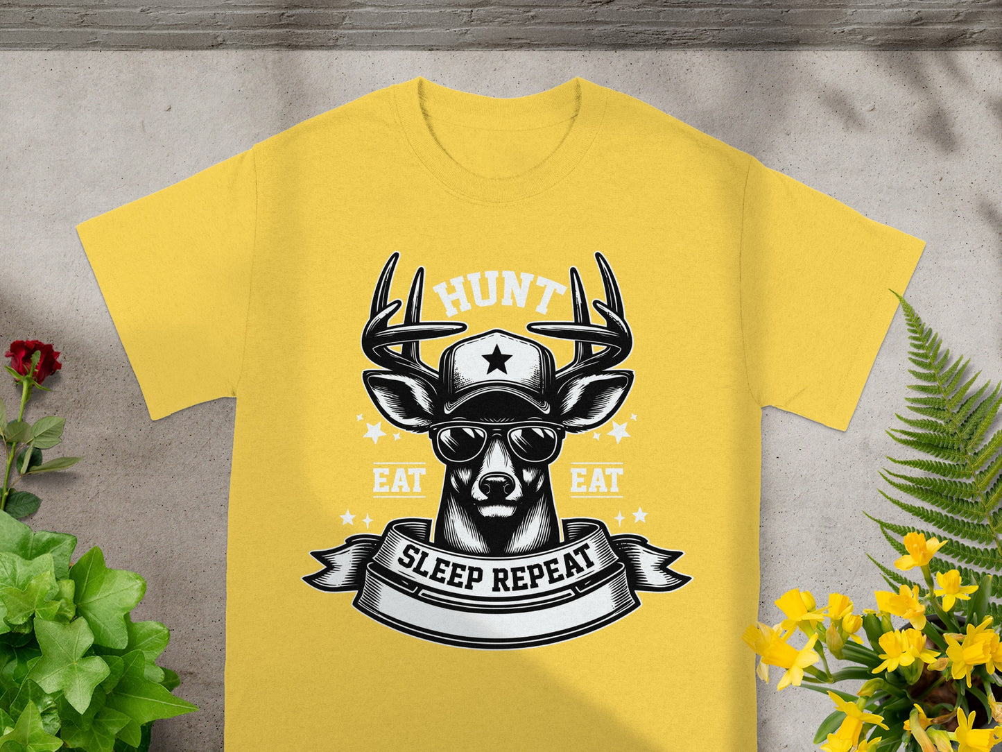 Yellow t-shirt with graphic of a deer wearing sunglasses and a cap, with text.