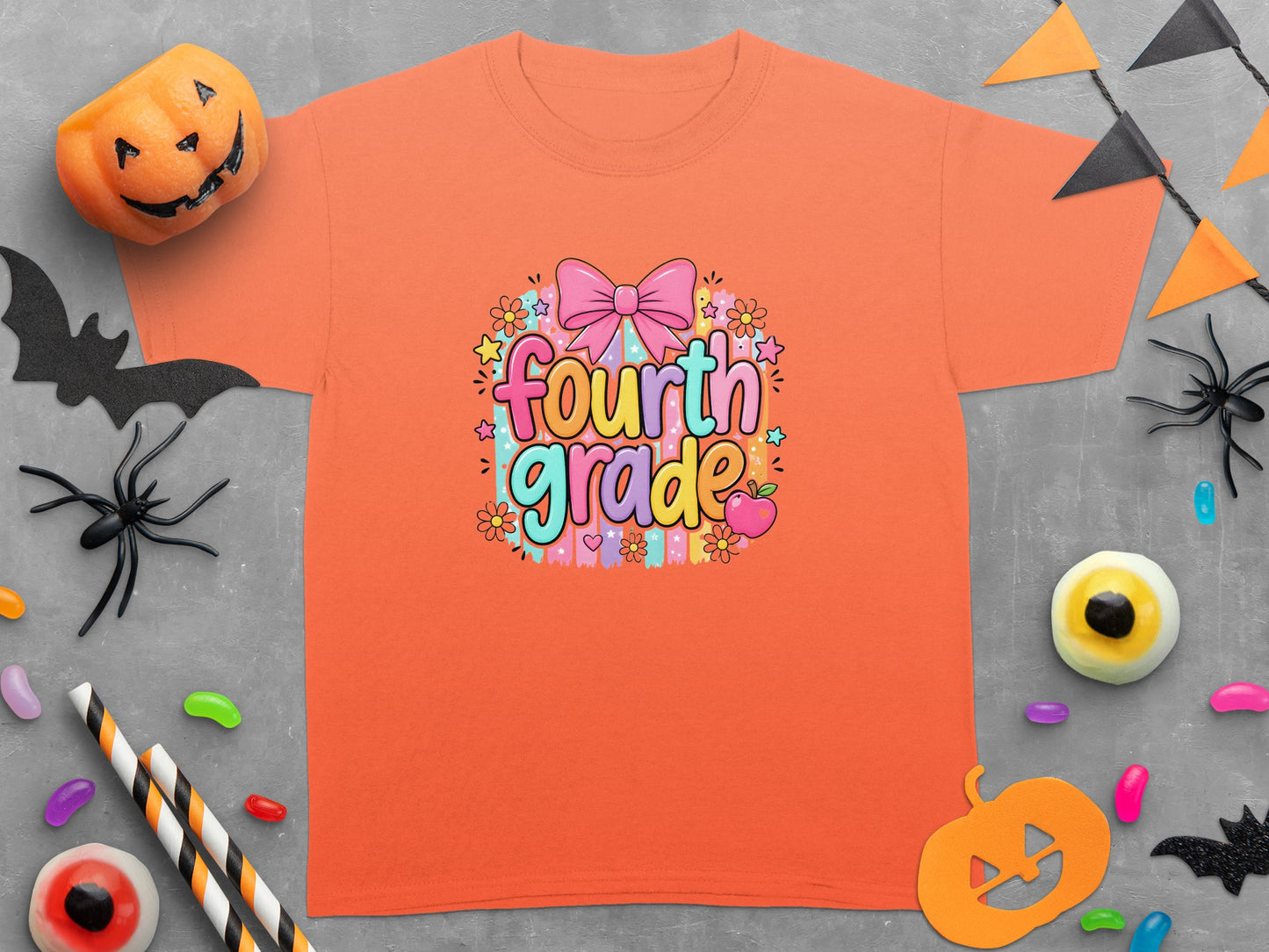 Orange t-shirt with "Fourth Grade" text design and Halloween decorations.