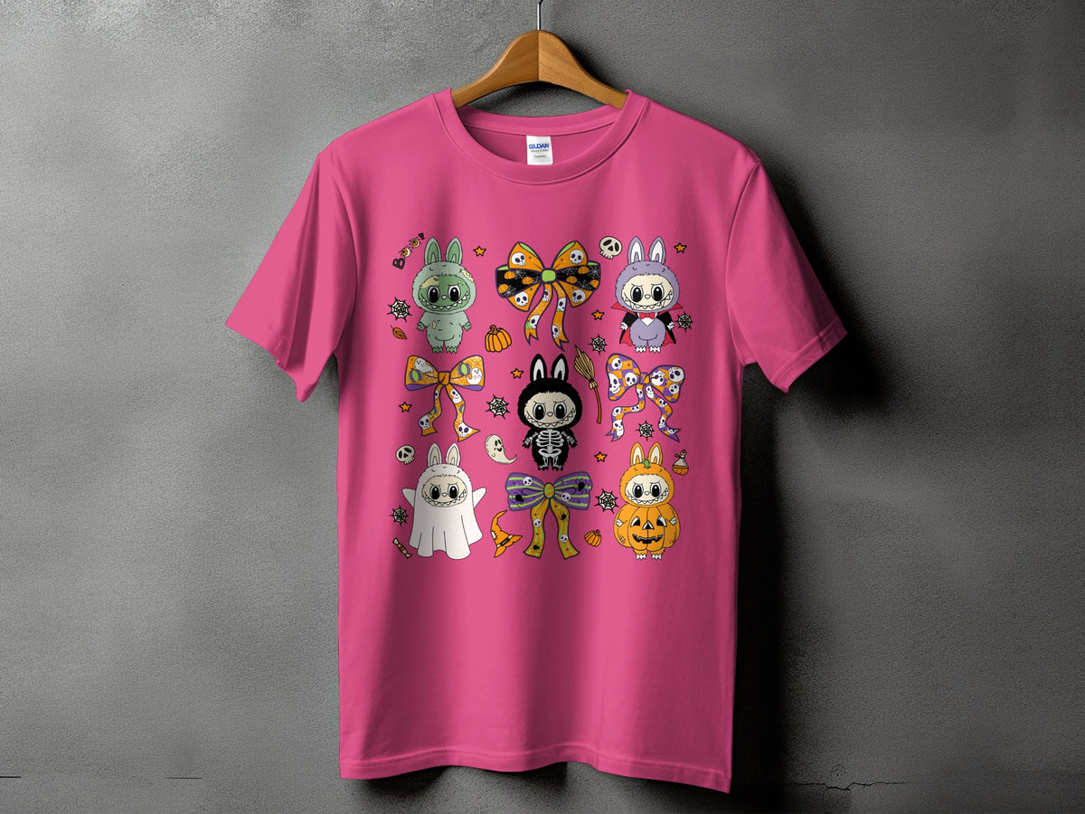 Pink t-shirt with various cute Halloween characters and festive bows.