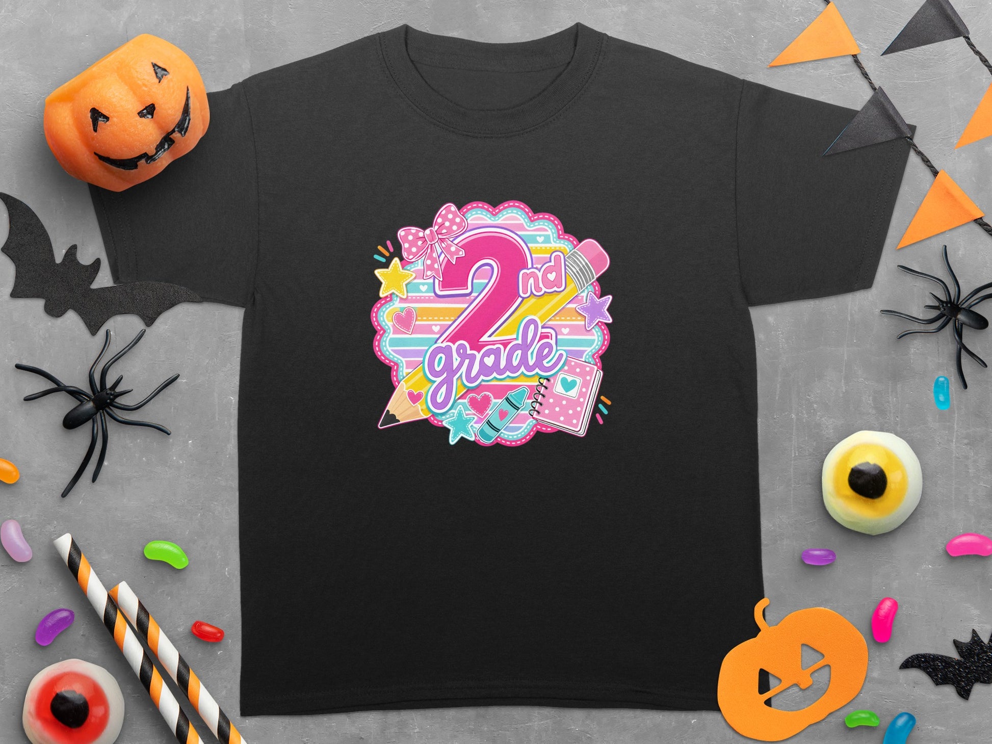 Black shirt with "2nd grade back to school" graphic featuring colorful school supplies and Halloween decorations.