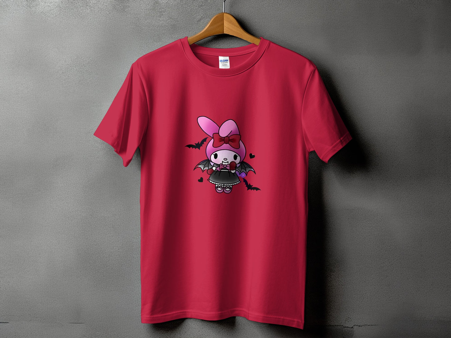Red t-shirt with a cartoon bat-winged bunny wearing a bow and a black dress.