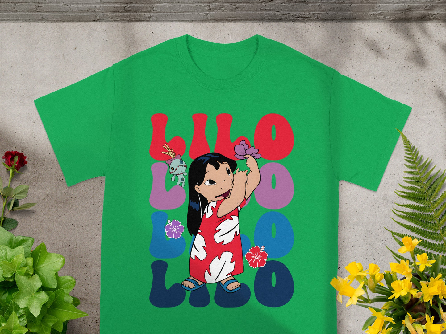 Green t-shirt with Lilo and Stitch graphic and "LILO" text.