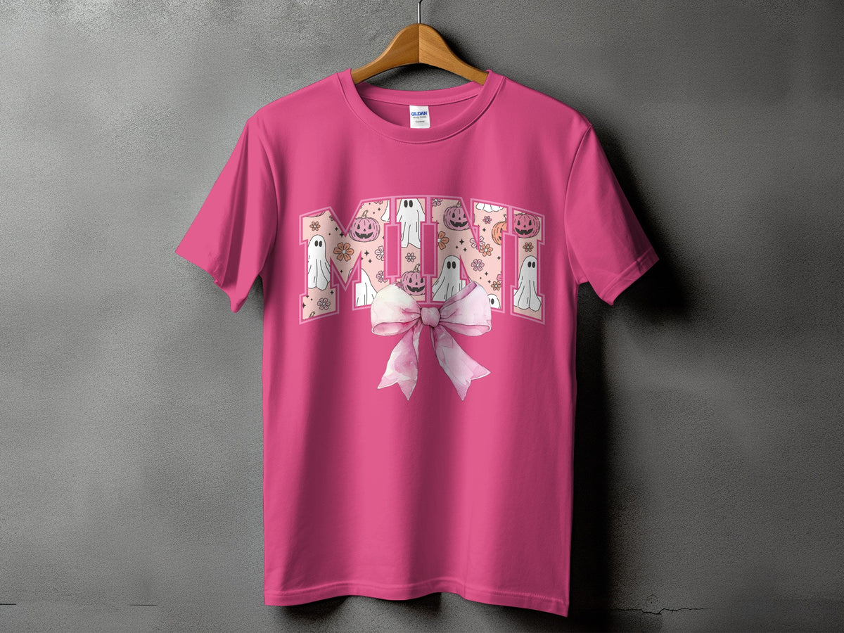 Pink t-shirt with "MINI" text featuring ghosts, pumpkins, and flowers.