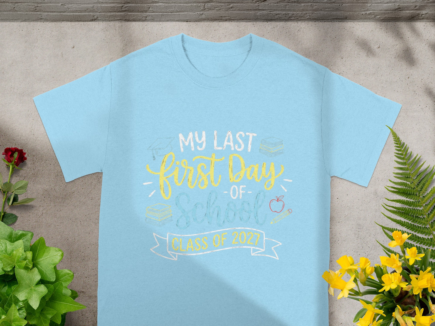 Light blue t-shirt with "My Last First Day of School Class of 2027" text.