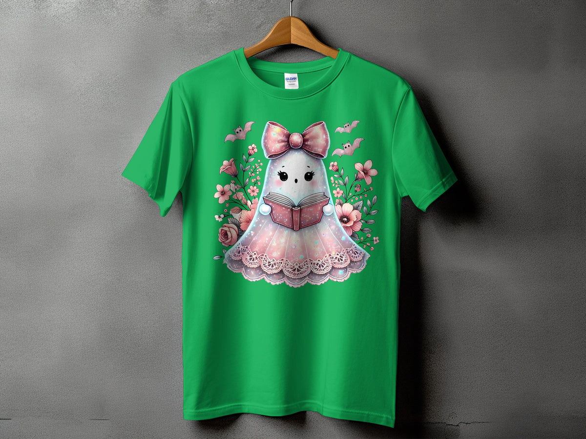Green t-shirt with a cute ghost reading a book and surrounded by flowers.