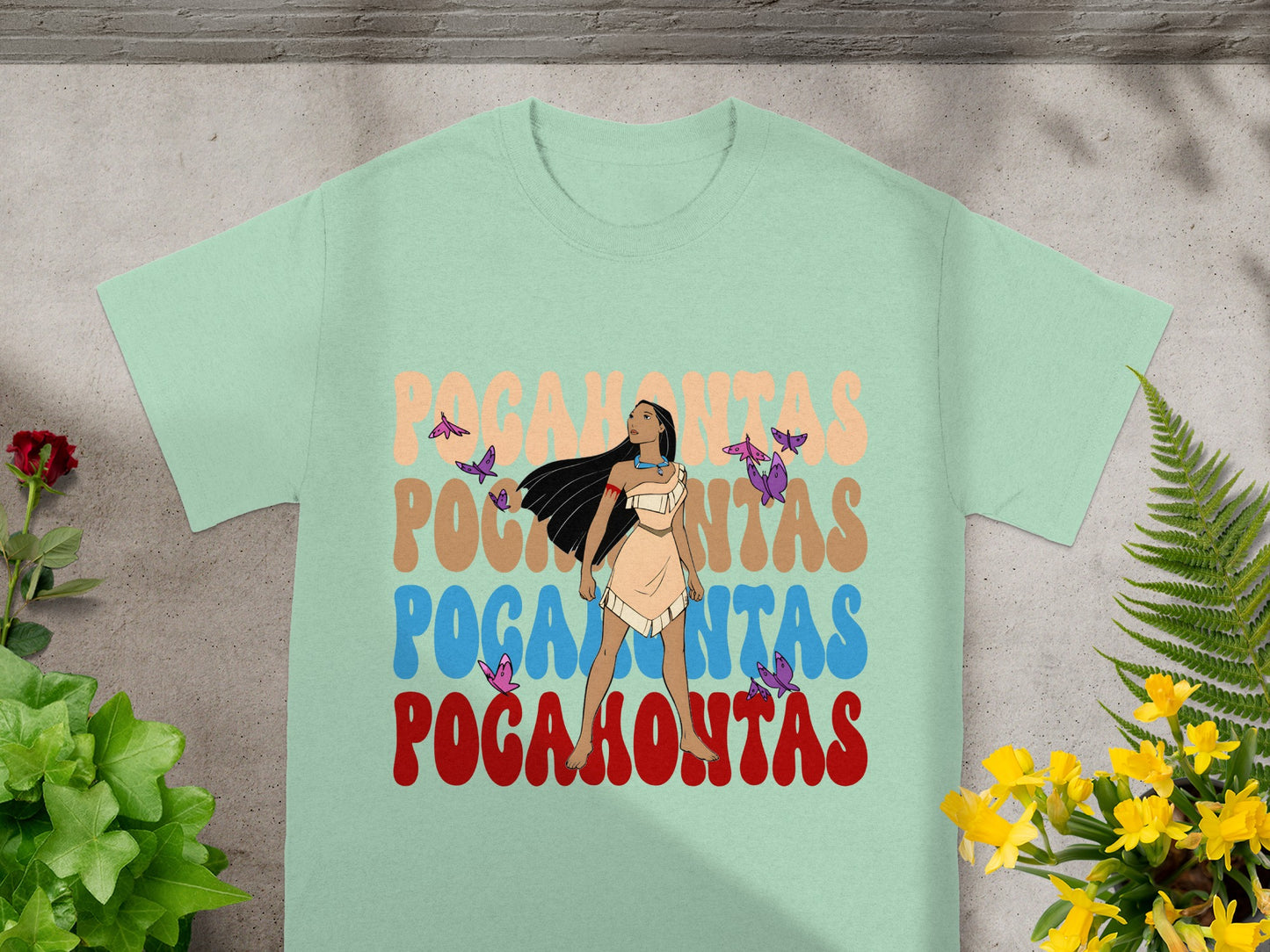 Pocahontas graphic t-shirt with butterflies and colorful text.