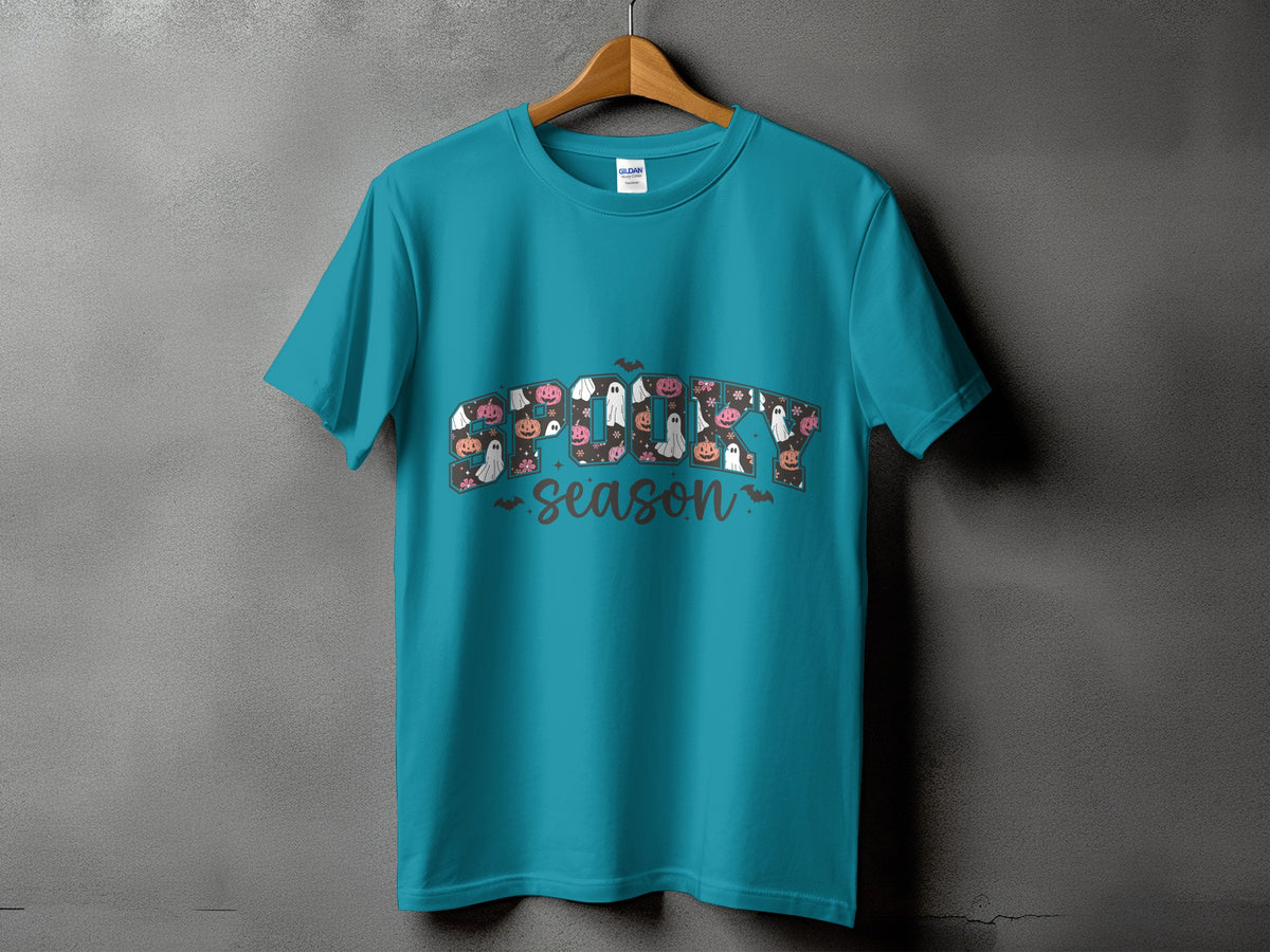 Teal t-shirt with "Spooky Season" text and Halloween illustrations.