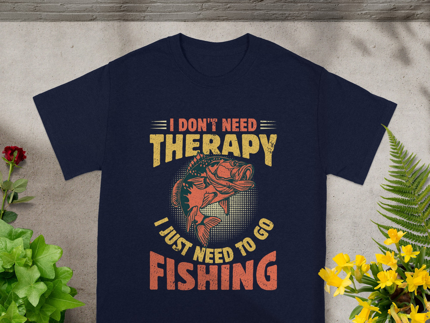 Navy t-shirt with text "I DON'T NEED THERAPY I JUST NEED TO GO FISHING" and a fish graphic.