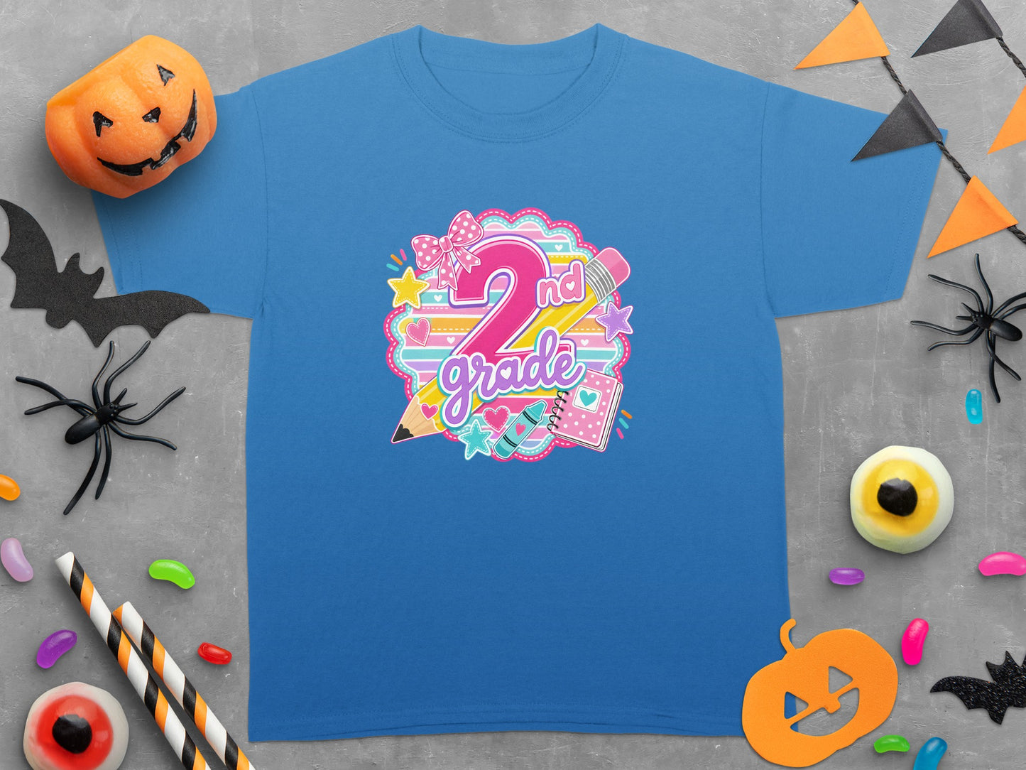 Blue t-shirt with "2nd grade" graphic featuring a large 2 and school supplies.
