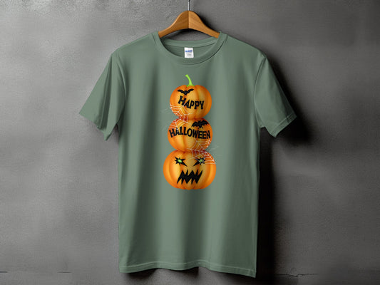 Green t-shirt with stacked pumpkins saying "Happy Halloween" and spiderwebs.