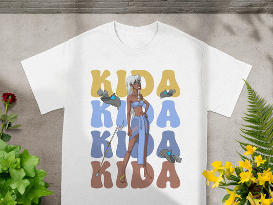 White t-shirt with Kida's name in large blue and yellow text.