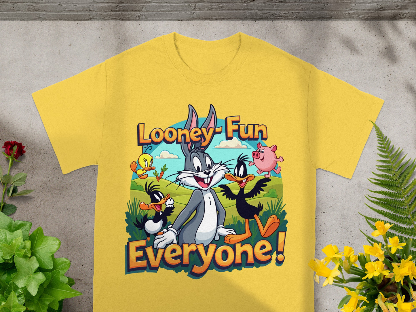 Looney Tunes characters Bugs Bunny, Daffy Duck, and Porky Pig on a yellow t-shirt.