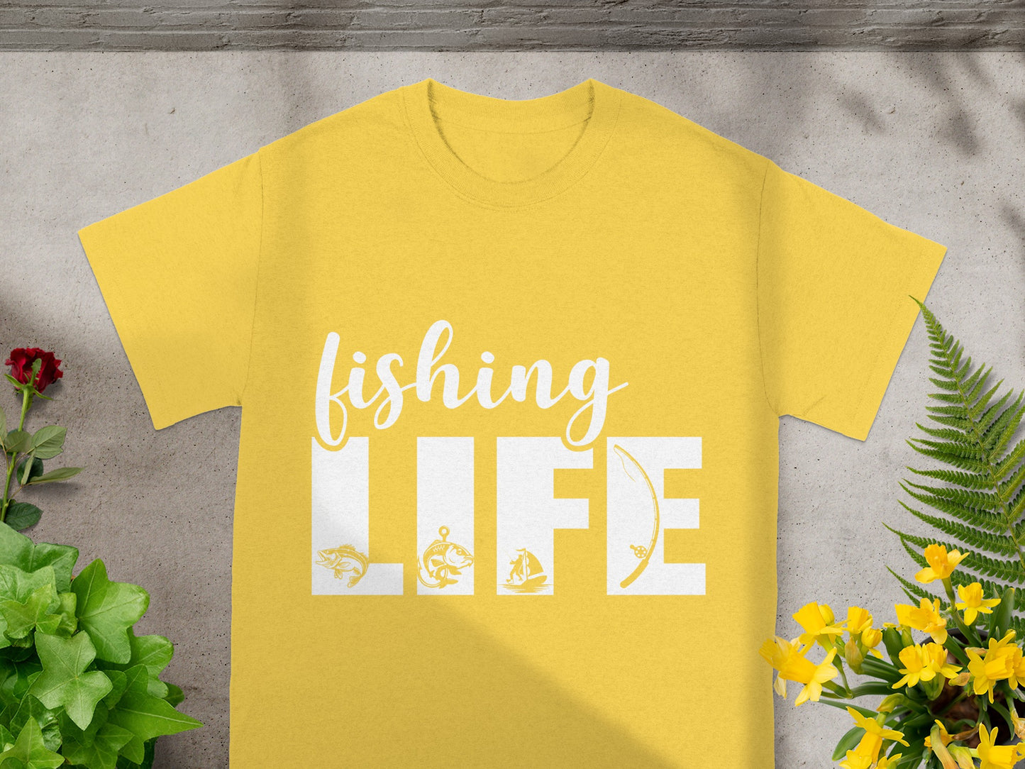 Yellow t-shirt with white text "fishing LIFE" and fishing graphics.