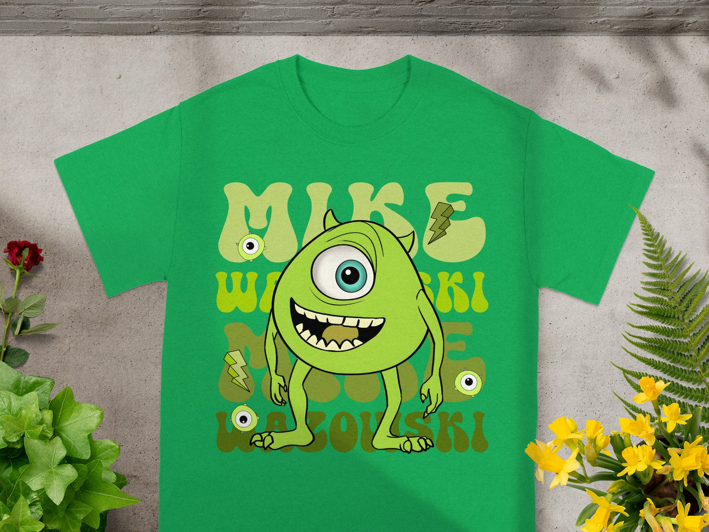 Green t-shirt with cartoon Mike Wazowski from Monsters Inc.