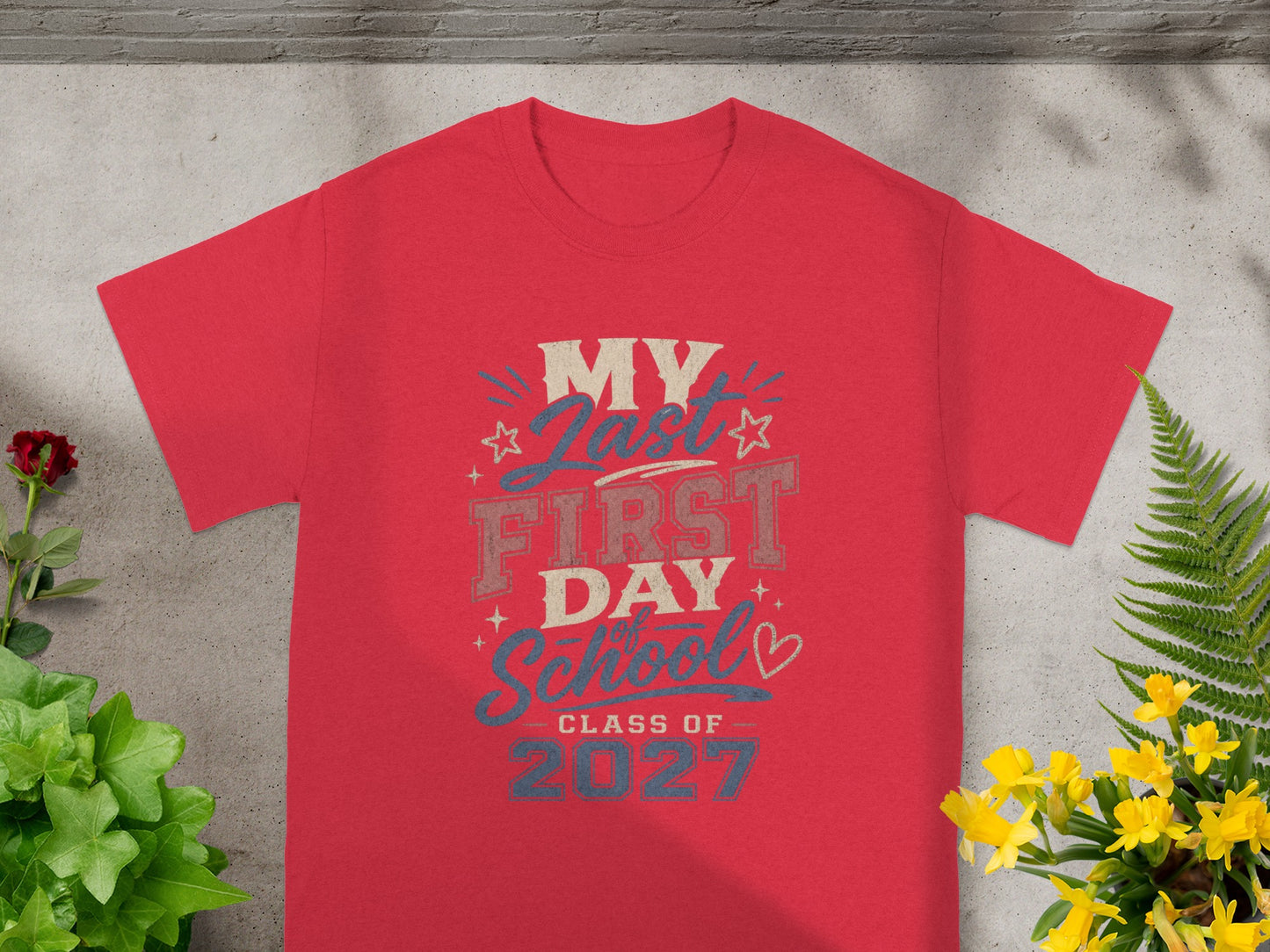 Red t-shirt with "My Last First Day School Class of 2027" graphic.
