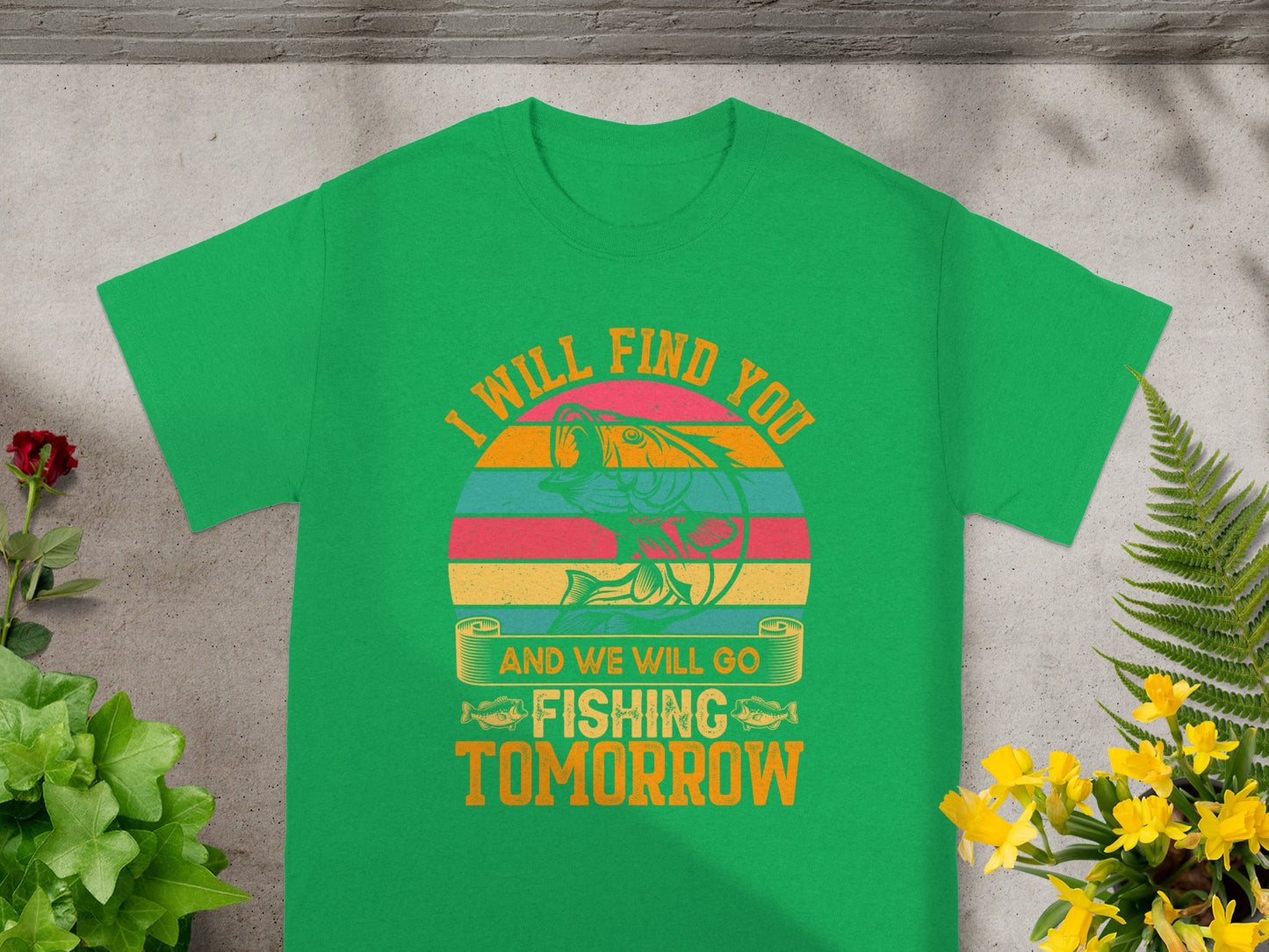 Green t-shirt with a bass jumping through a sunset circle, text says "I will find you" and "And we will go fishing tomorrow."