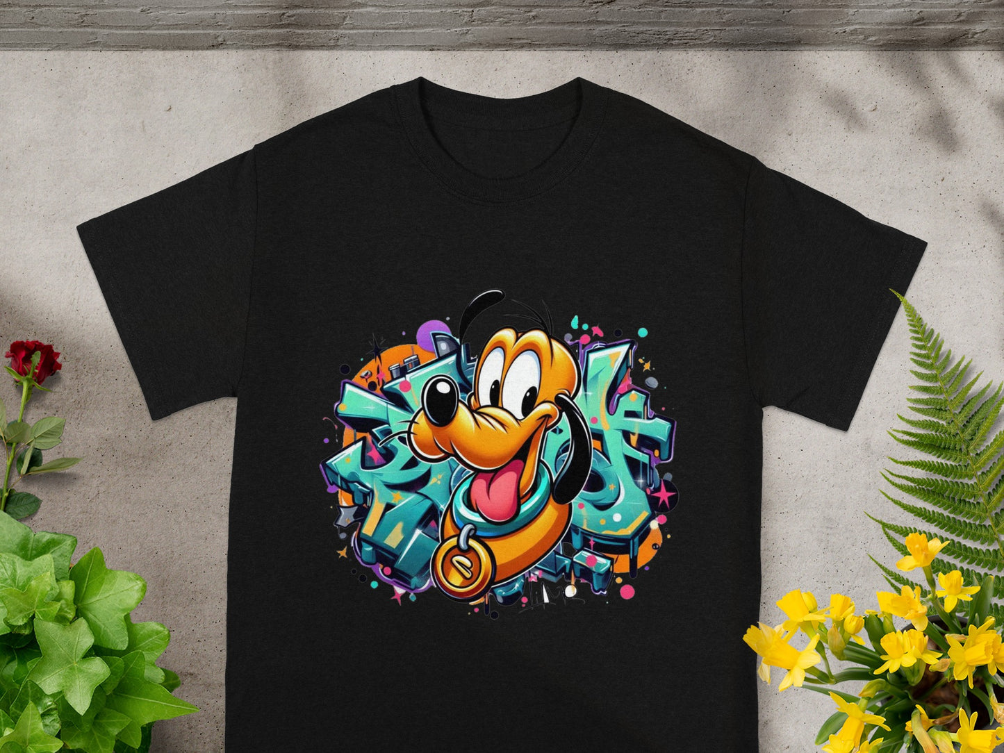 Black t-shirt with colorful graffiti art featuring cartoon dog character Pluto.