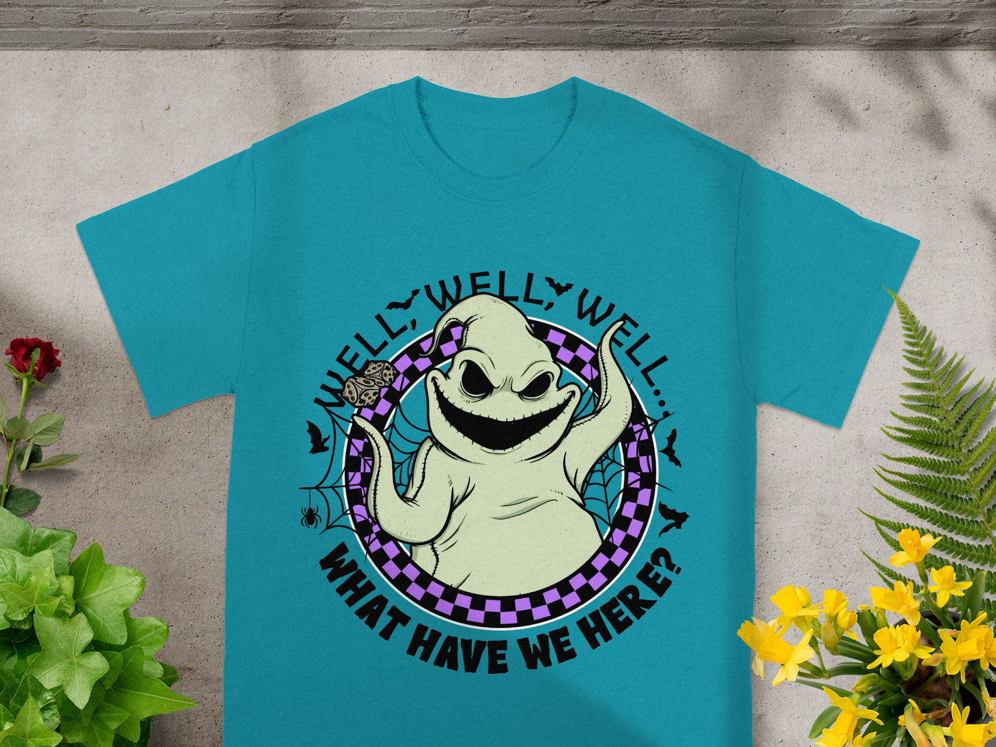 Teal t-shirt featuring Oogie Boogie with text "Well, well, well... What have we here?"