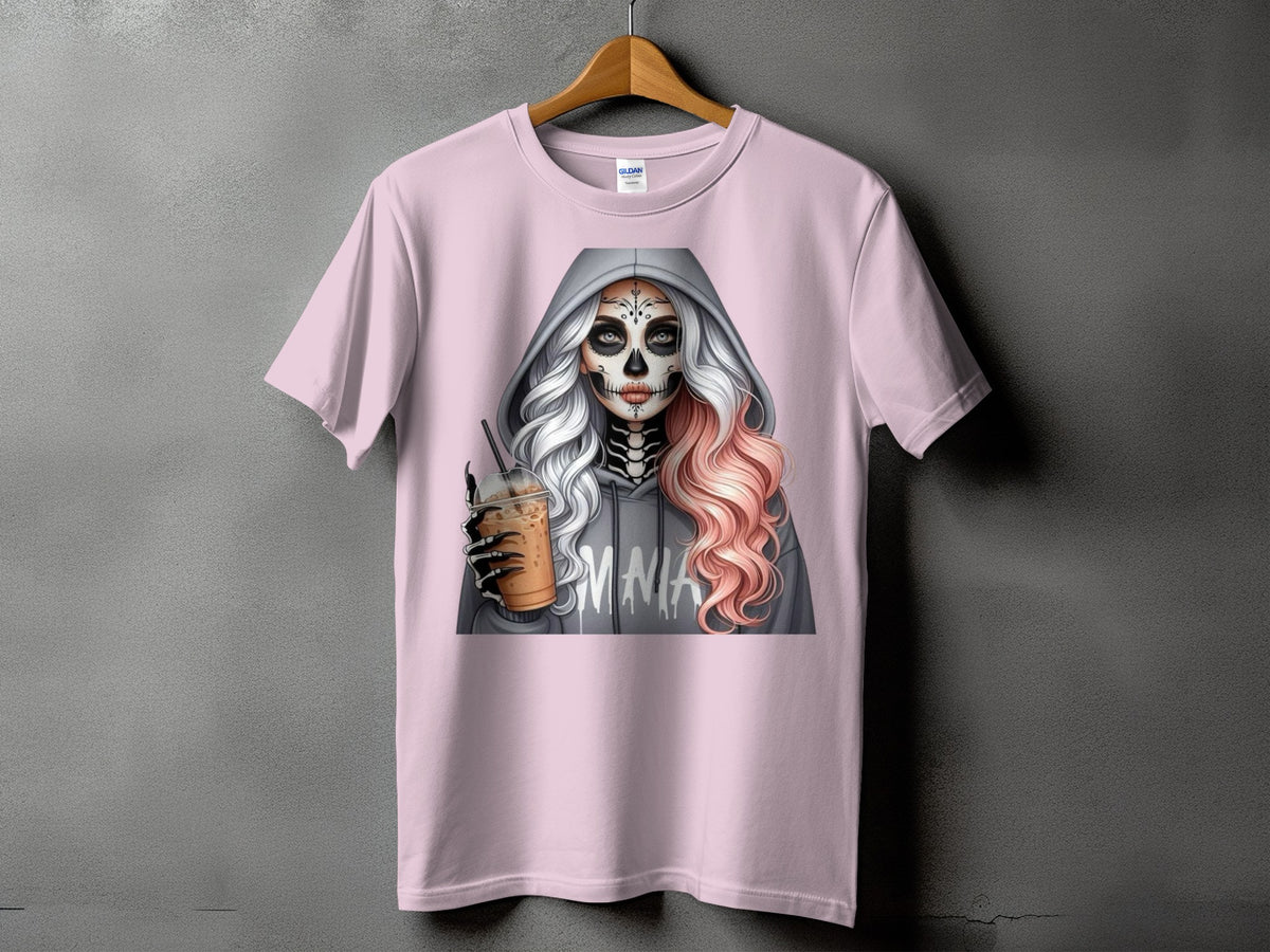 Pink t-shirt with skull makeup woman holding iced coffee and wearing a grey hoodie with "EMNA" printed on it.