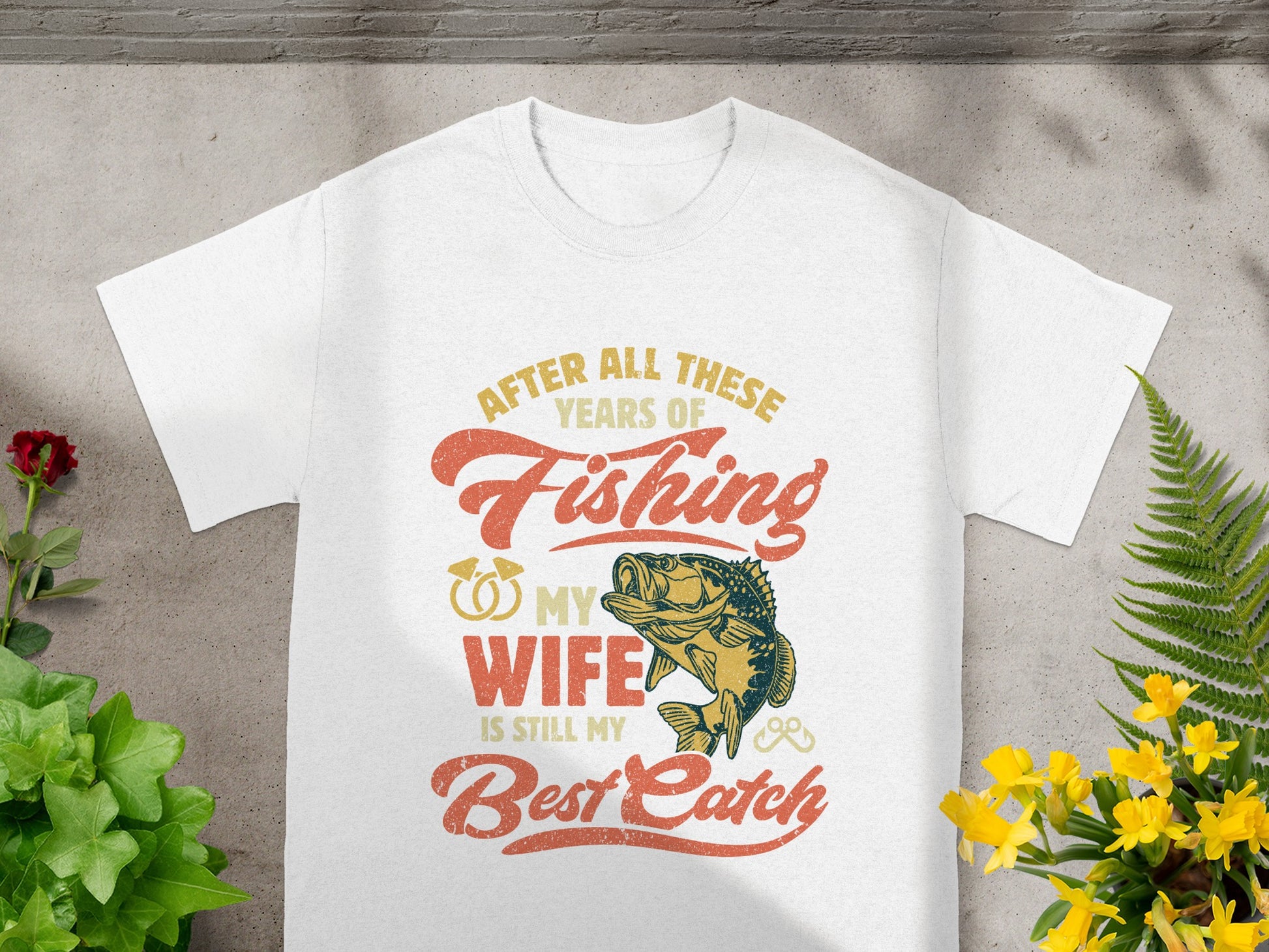 White t-shirt with distressed text and graphics about fishing and a wife.