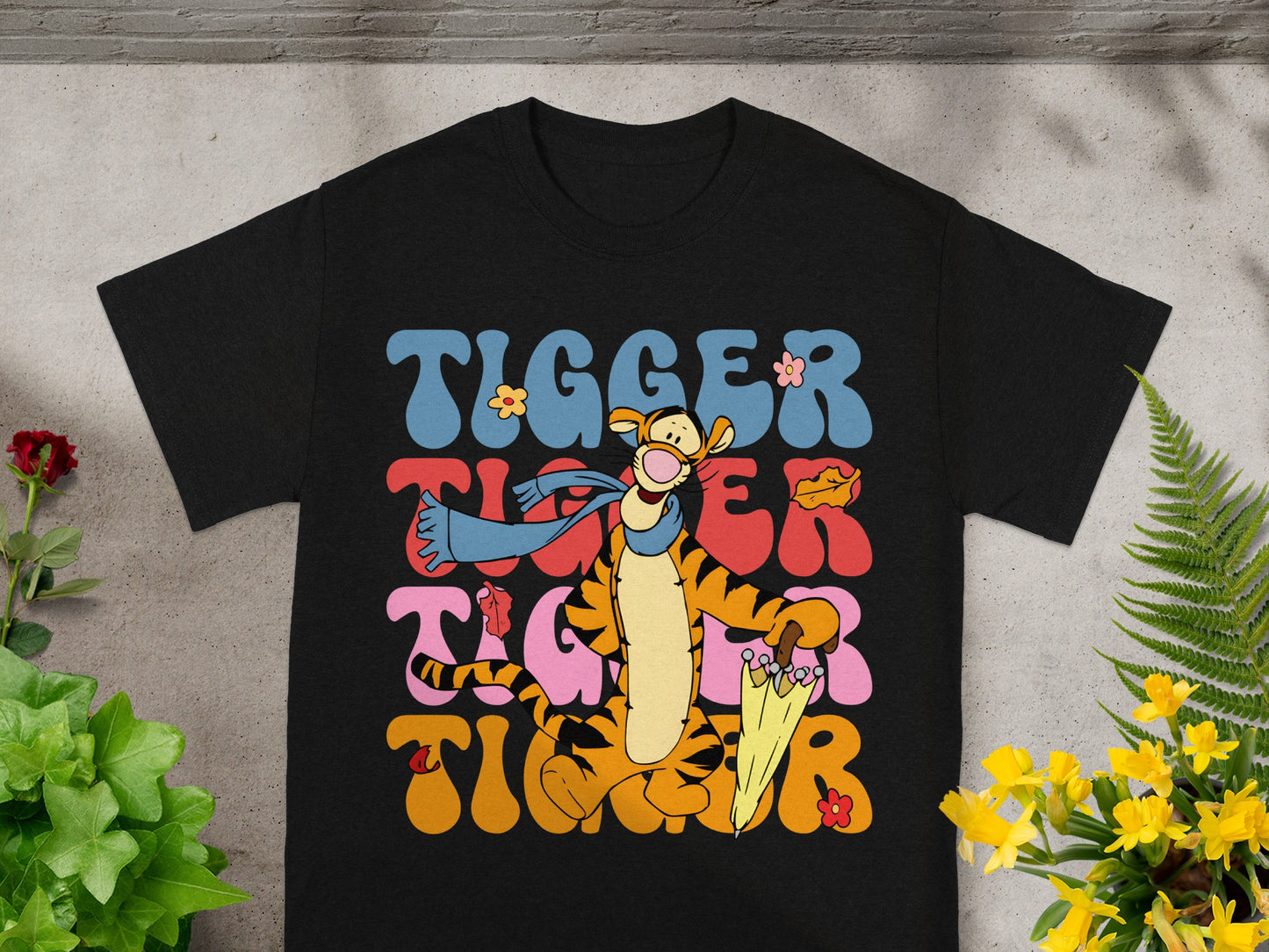 Black t-shirt with Tigger graphic and retro-style text.