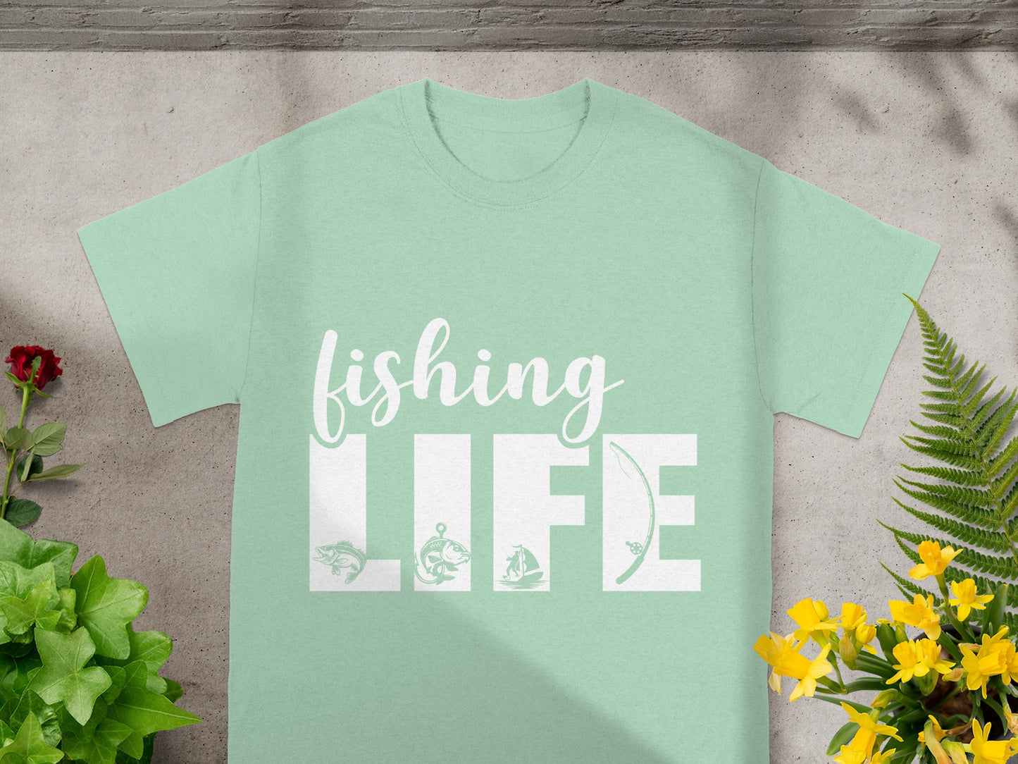 Mint t-shirt with "Fishing Life" graphic and fishing imagery.