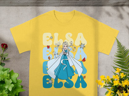 Yellow t-shirt with Elsa from Frozen graphic and text.