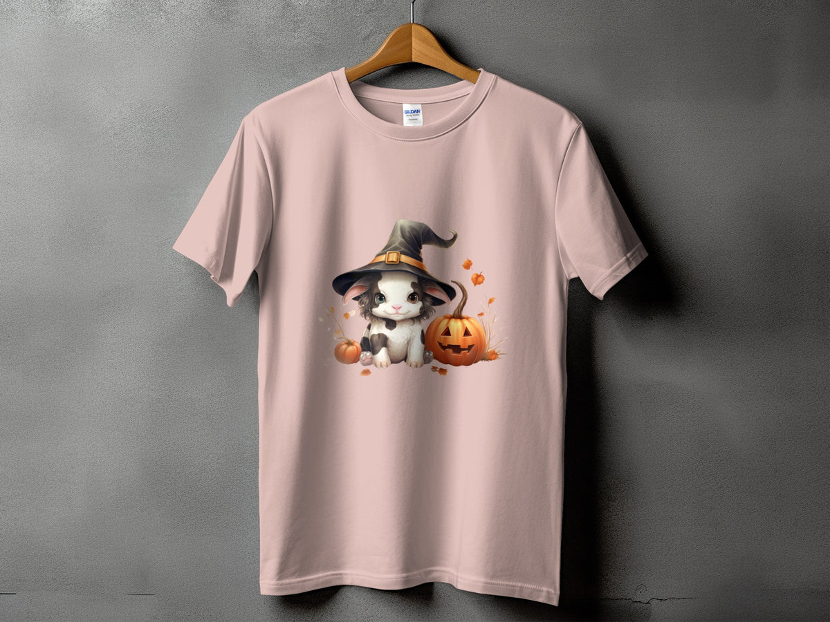 Pink t-shirt with Halloween graphic of a kitten in a witch hat and pumpkins.