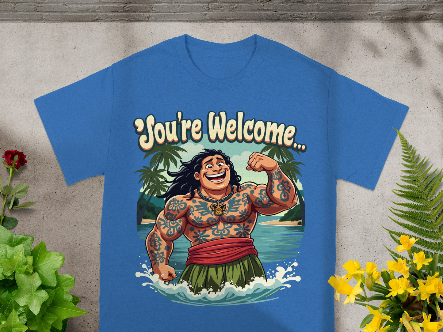 Blue t-shirt with cartoon Maui and text "You're Welcome..."