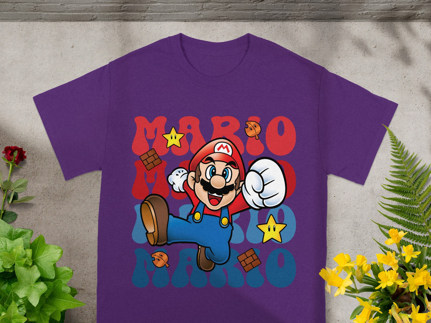 Purple t-shirt with Mario and red brick graphics.