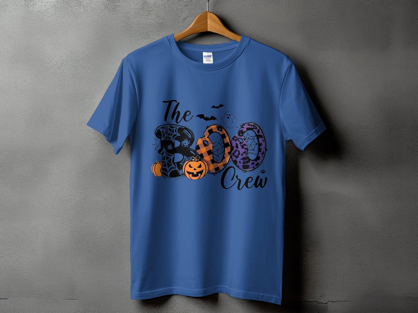 Blue t-shirt with "The Boo Crew" Halloween graphic featuring pumpkins and bats.