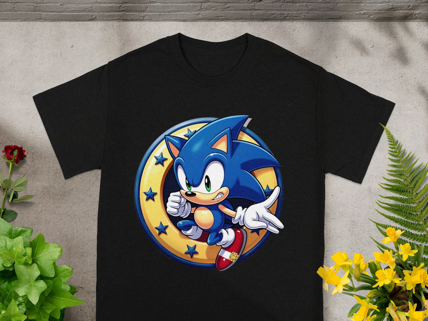 Black t-shirt featuring Sonic the Hedgehog running within a gold circle of stars.