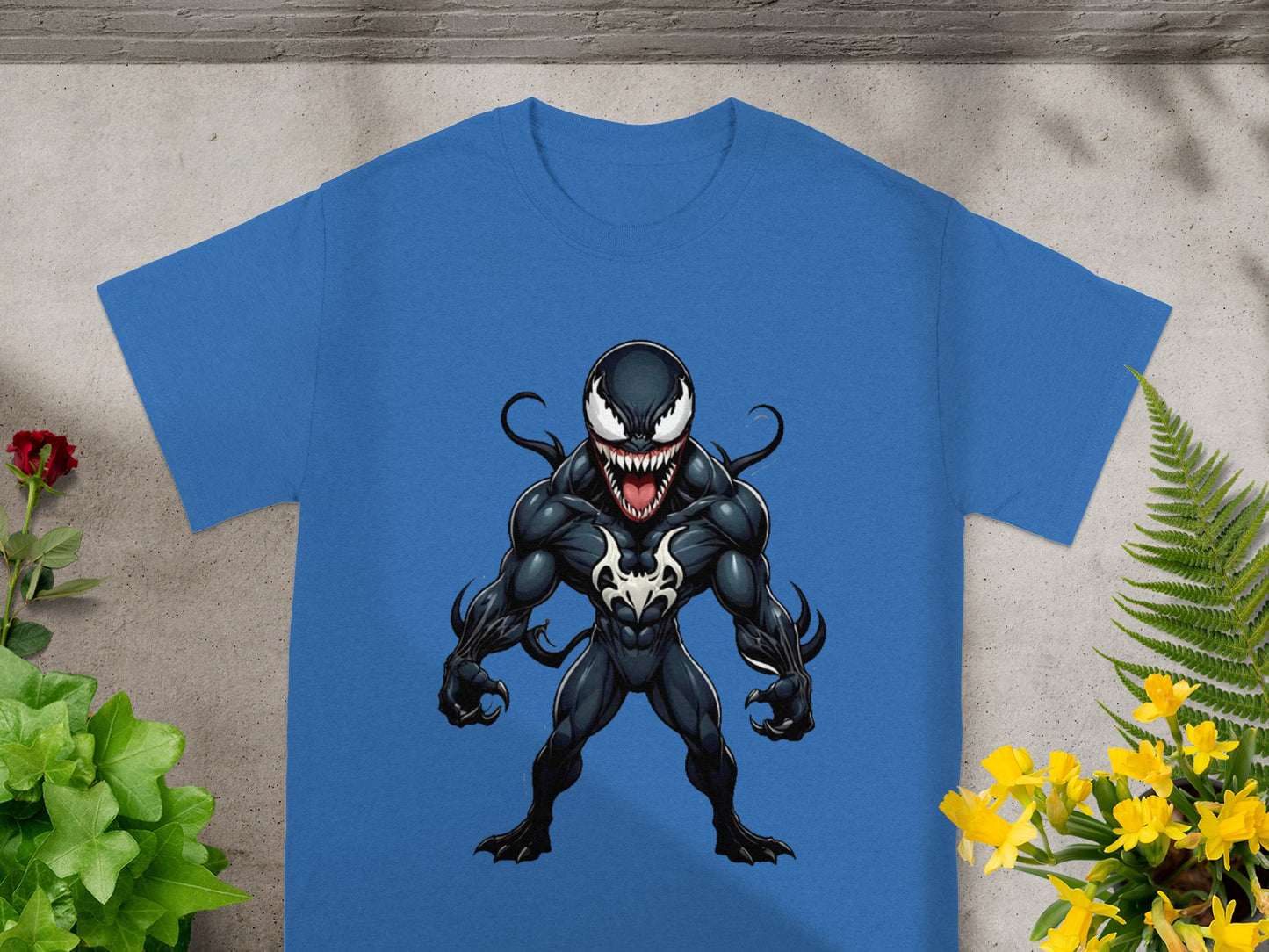 Blue t-shirt featuring a graphic of the Marvel character Venom.