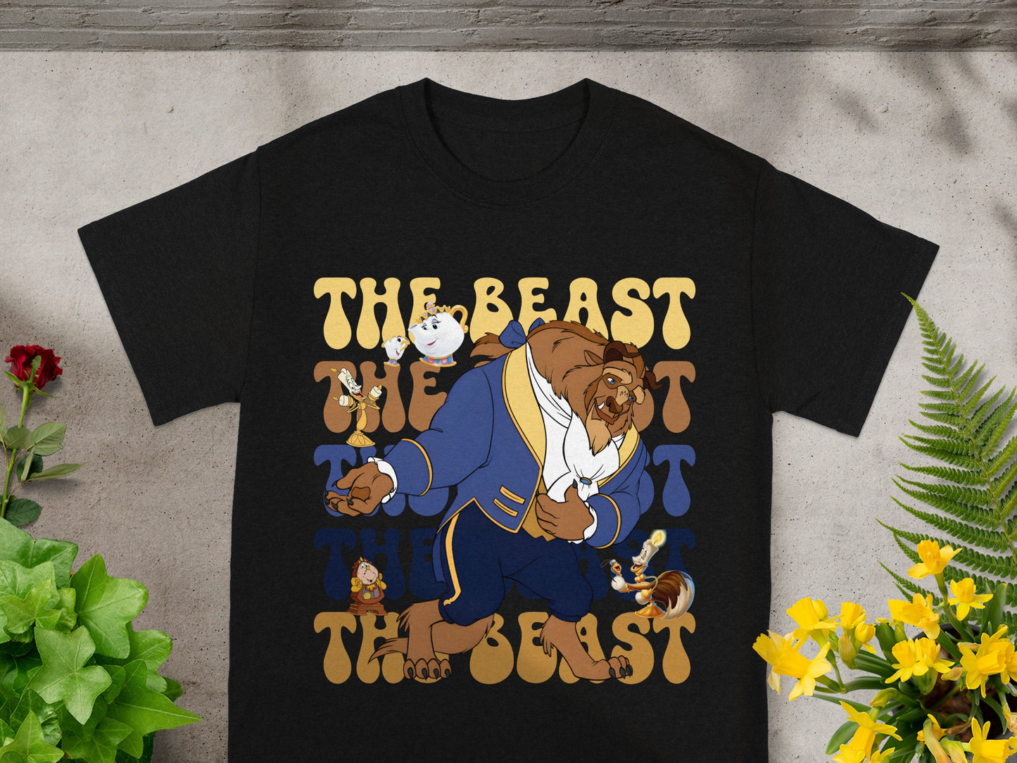 Black t-shirt with "The Beast" text and illustration of Beast from Beauty and the Beast.