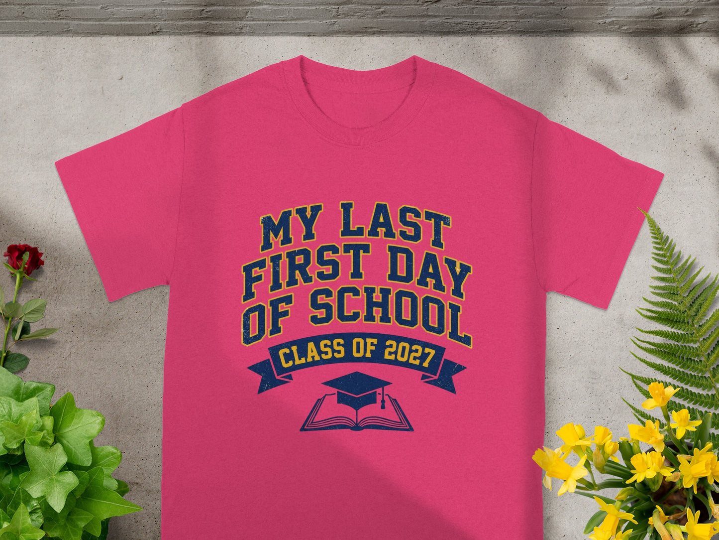 Pink t-shirt with "My Last First Day Of School Class Of 2027" text.
