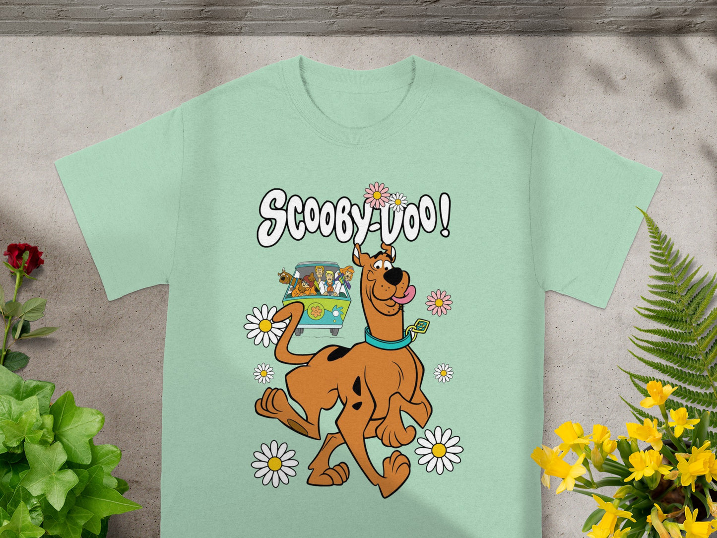 Scooby-Doo t-shirt design with Scooby and the Mystery Machine surrounded by daisies.