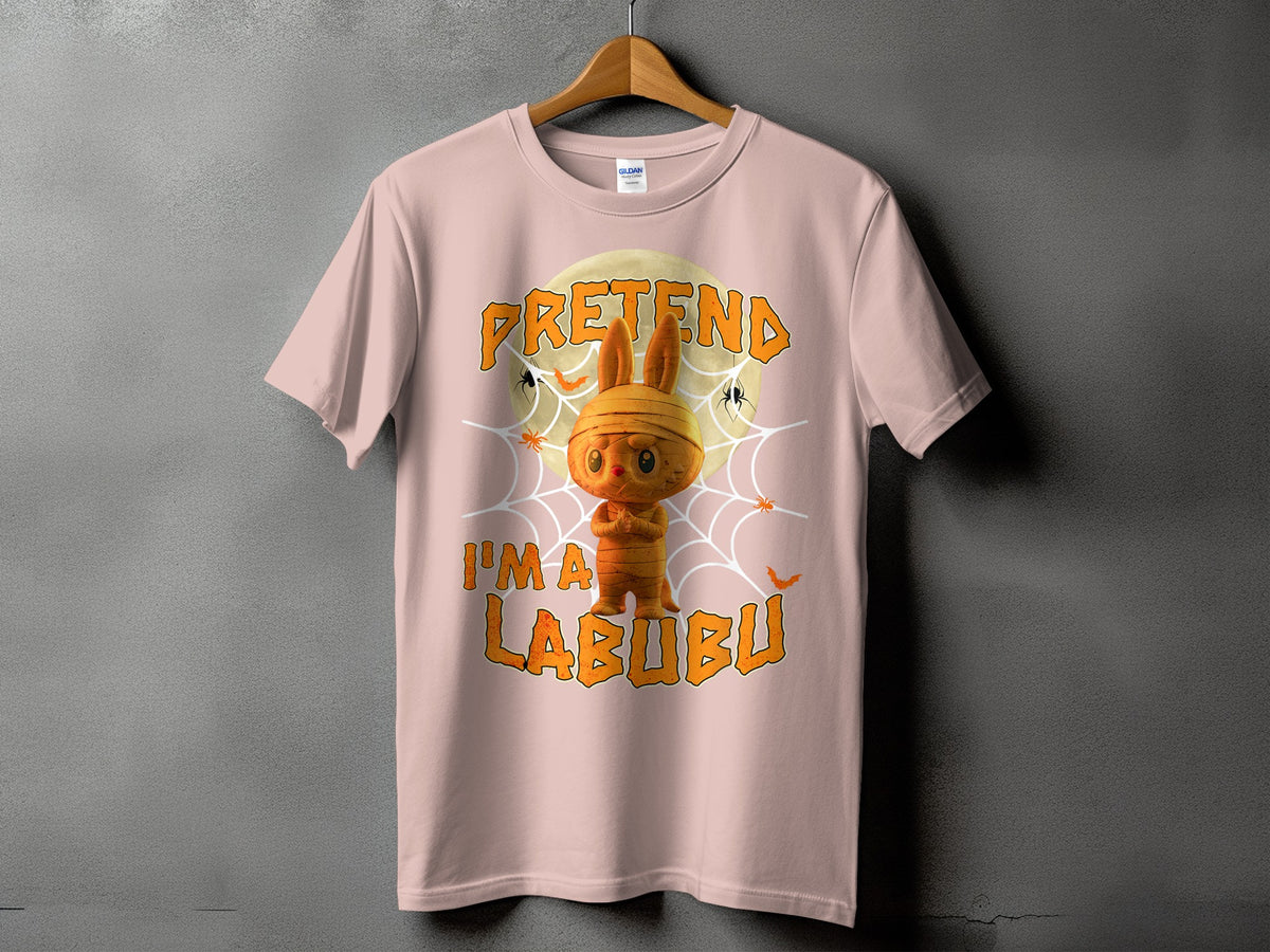 Pink t-shirt with a mummy bunny graphic and text "Pretend I'm a Labubu".