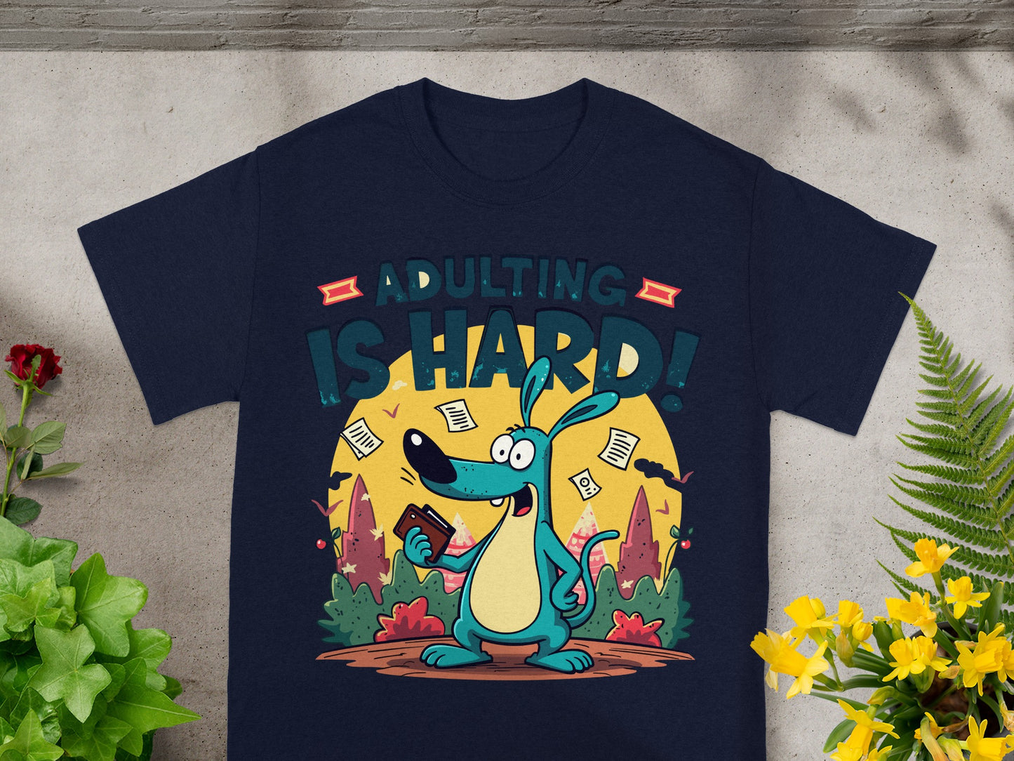 Shirt with cartoon dog holding wallet and text "ADULTING IS HARD!"