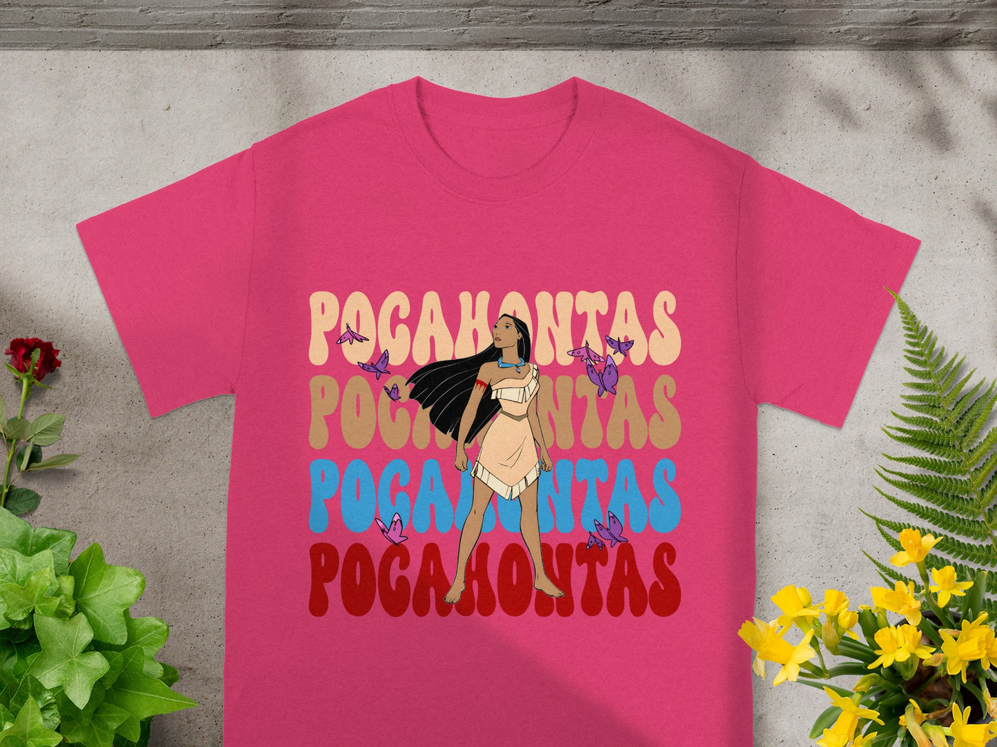 Pink t-shirt with "Pocahontas" in colorful, retro lettering.