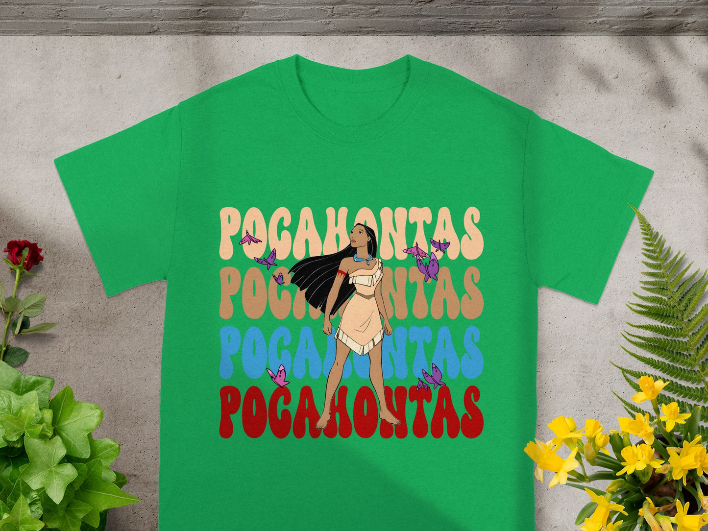 Green t-shirt with "Pocahontas" text and butterflies.