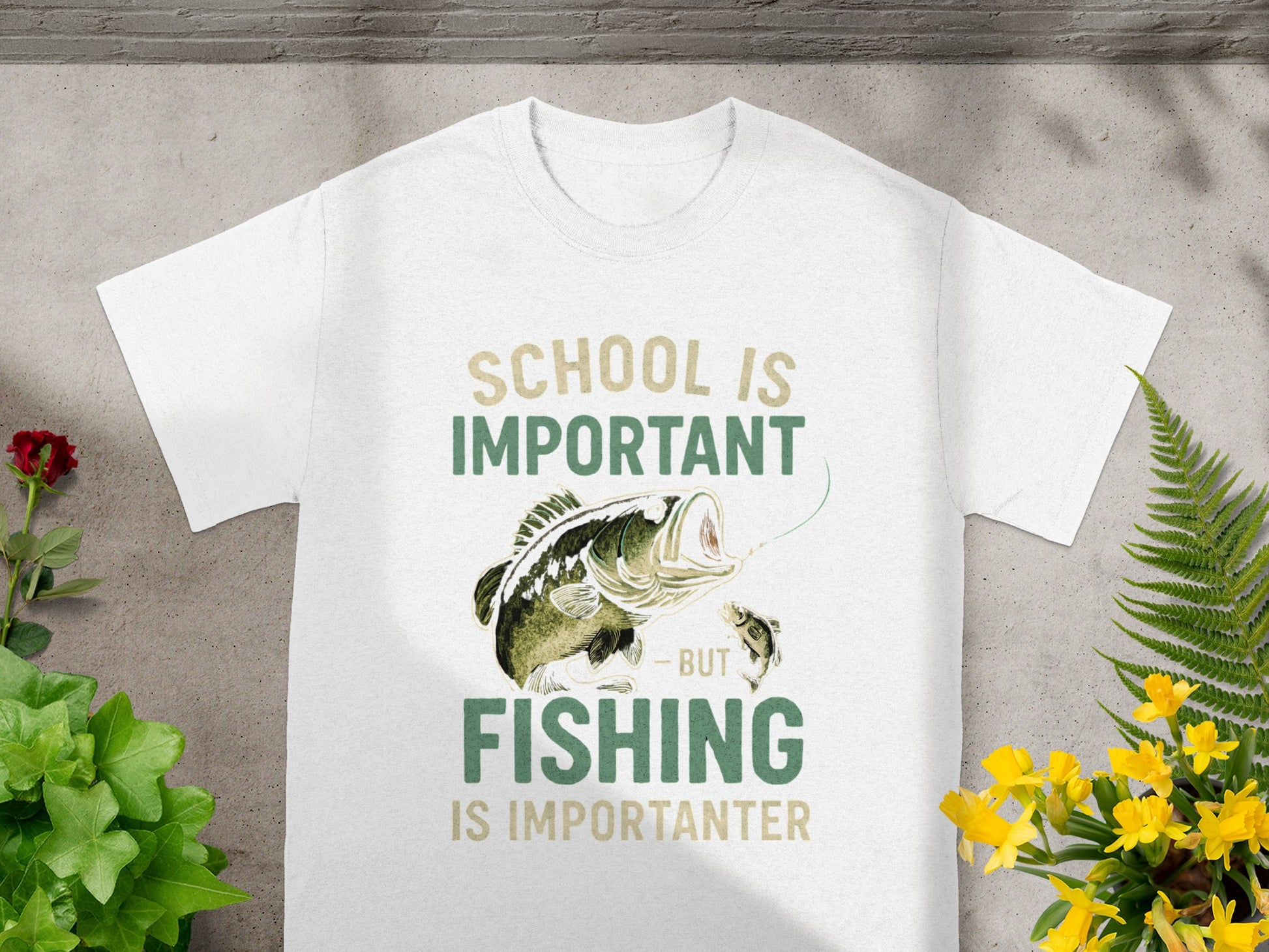White t-shirt with "School is important but fishing is importanter" text and graphic.