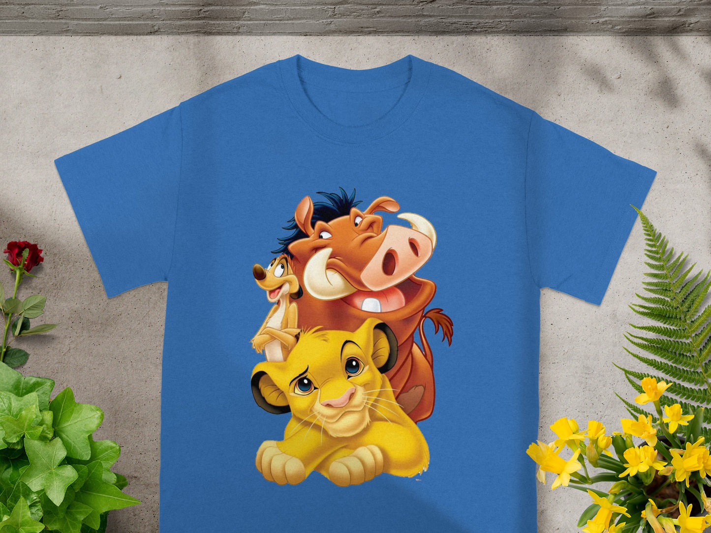 Blue t-shirt with Simba, Timon, and Pumbaa from The Lion King.