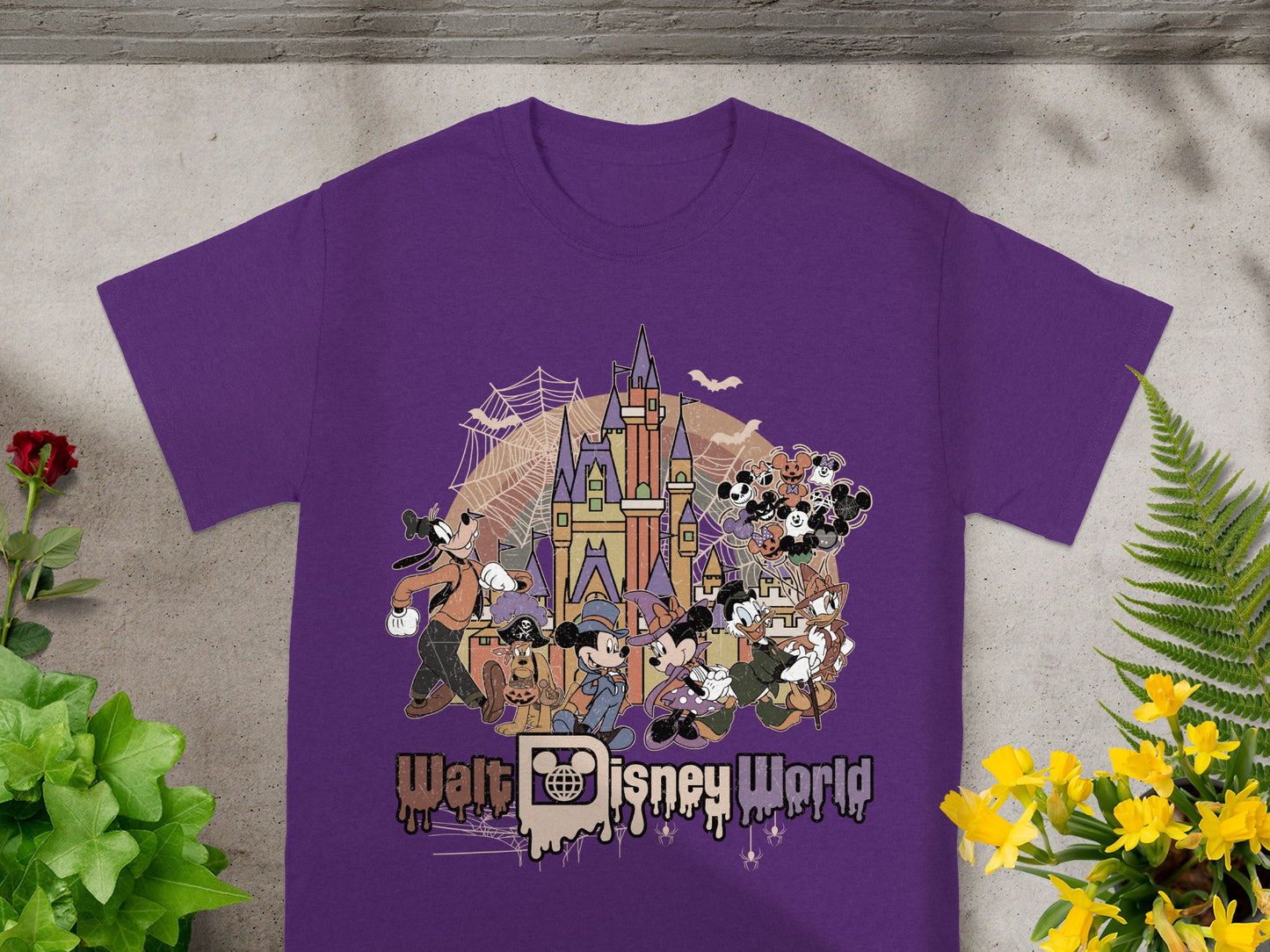Purple t-shirt with Halloween Disney characters and Walt Disney World text.