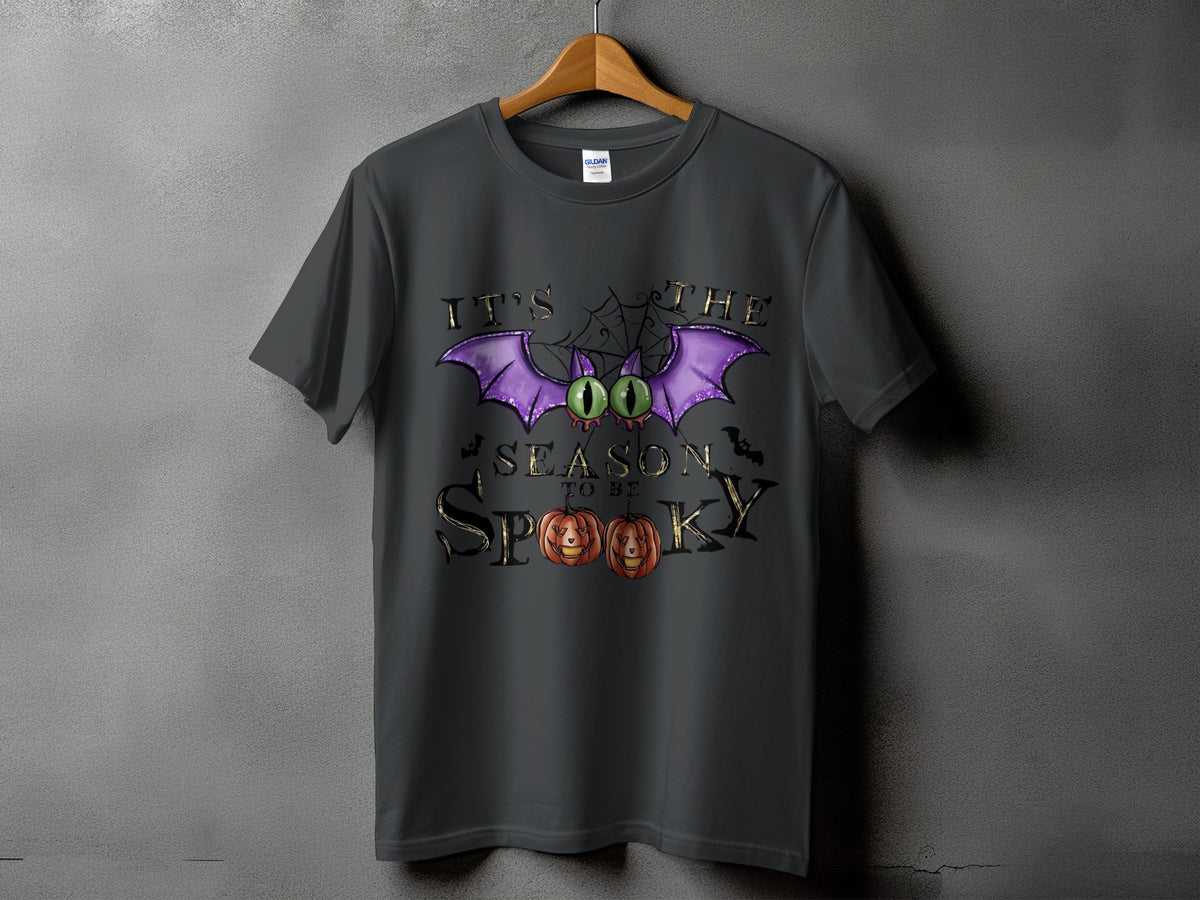 Dark gray t-shirt with "It's the season to be spooky" Halloween graphic.