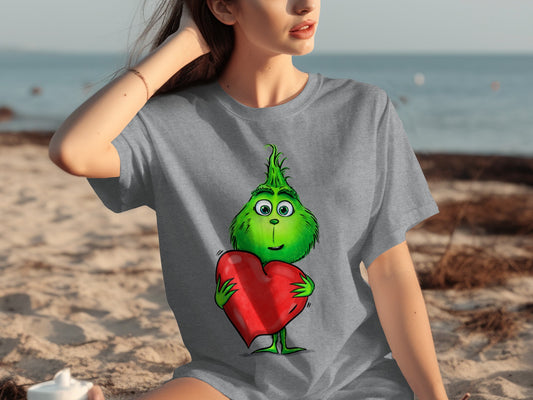 Cute Green Grinch Holding a Heart T-shirt
