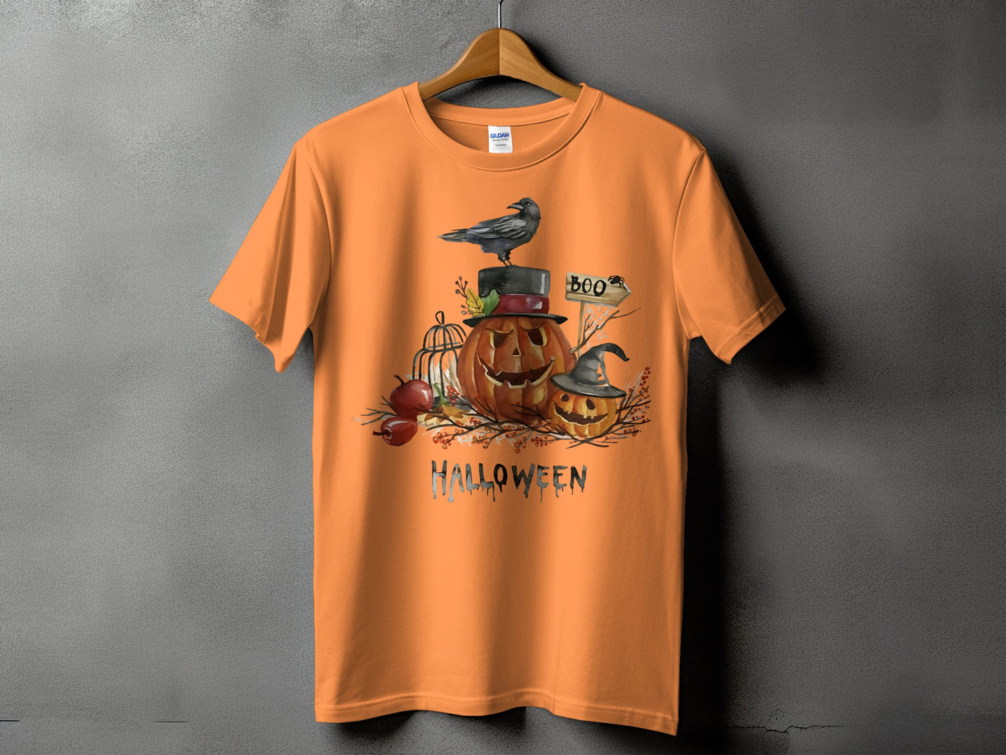 Orange t-shirt with Halloween pumpkins, crow, and text.