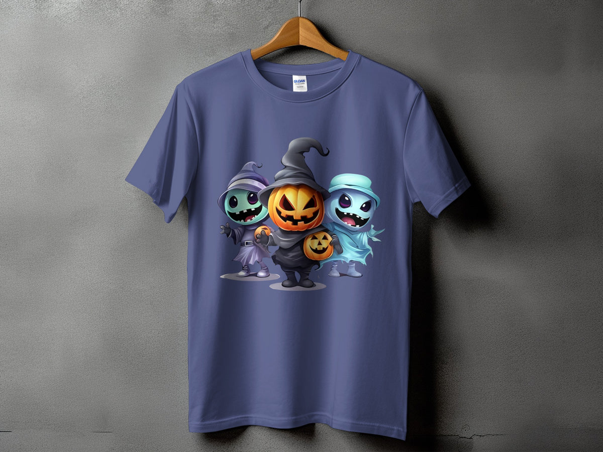 Purple t-shirt featuring three cartoon Halloween characters: a witch, a jack-o'-lantern, and a ghost.
