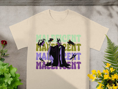 Maleficent graphic on a tan t-shirt with green and purple text.