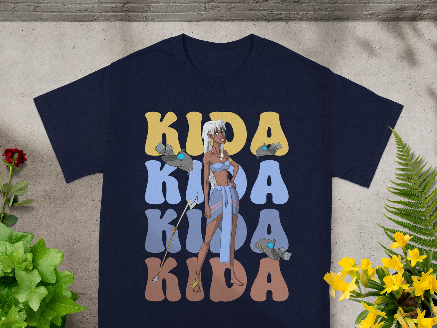 Navy t-shirt with Kida character and stylized Kida text design.