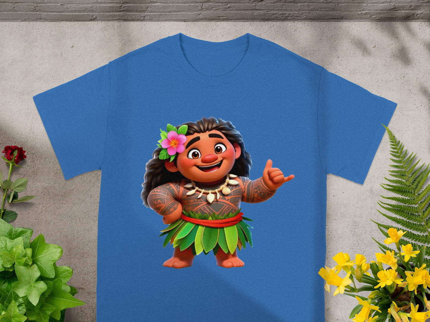 Blue t-shirt with Moana character illustration, showing her giving a shaka hand sign.